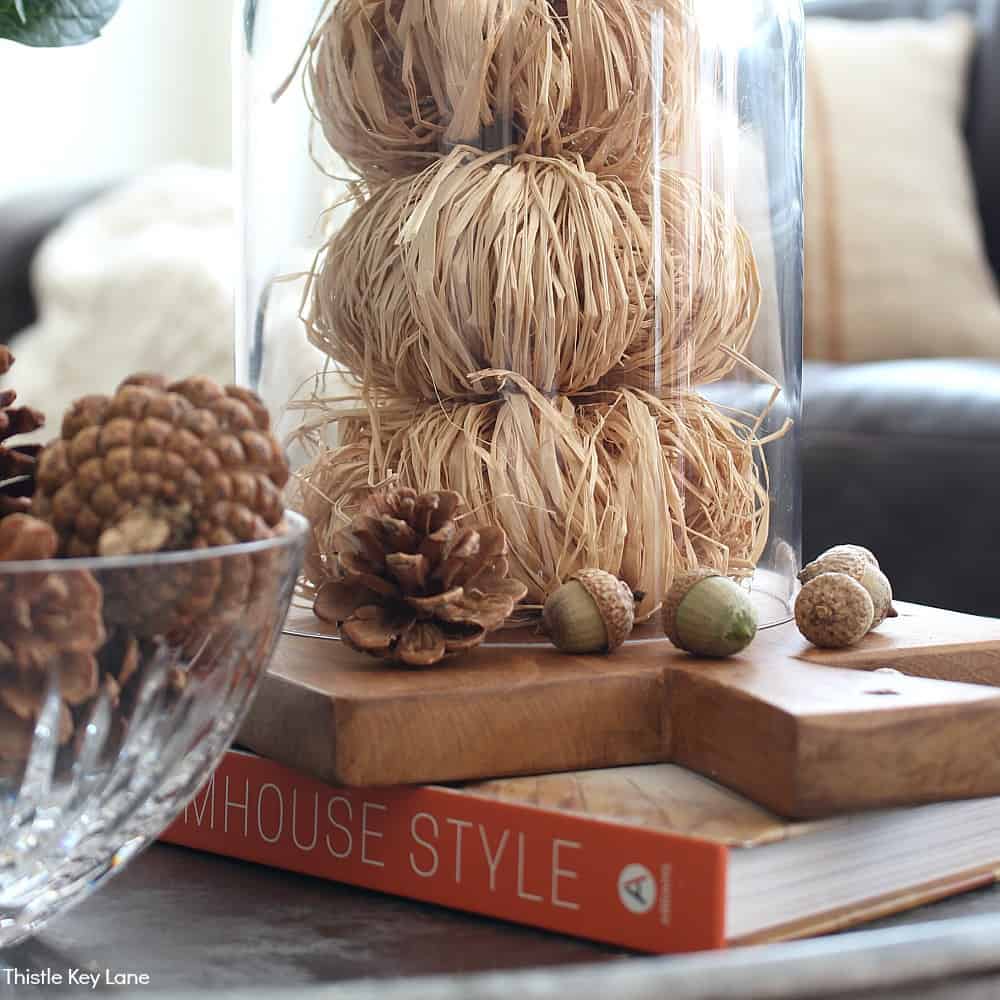 Fall Cloche With Raffia Pumpkins