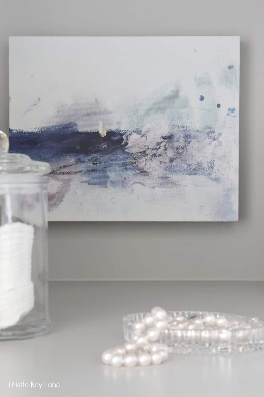 Abstract artwork in linen closet.