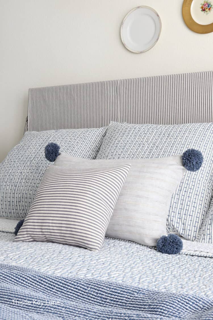 Blue pom pom pillow best sale