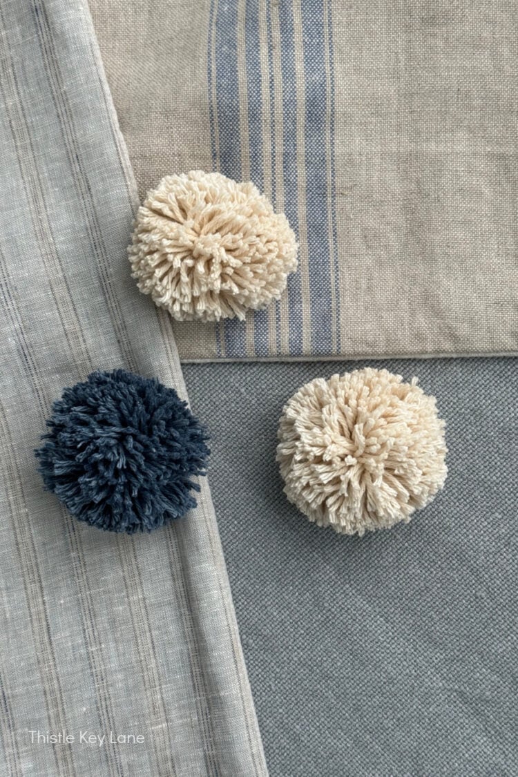 Gray pom pom pillow best sale