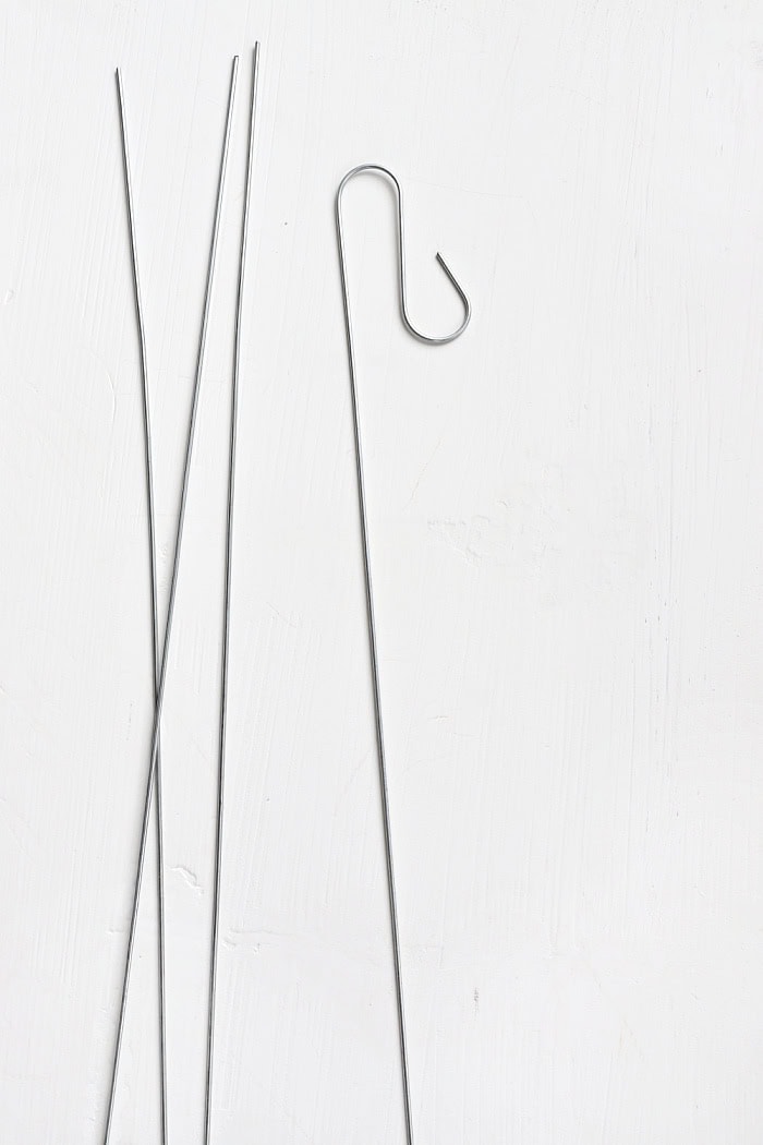 Create hanger with wire to display ornamnets. 