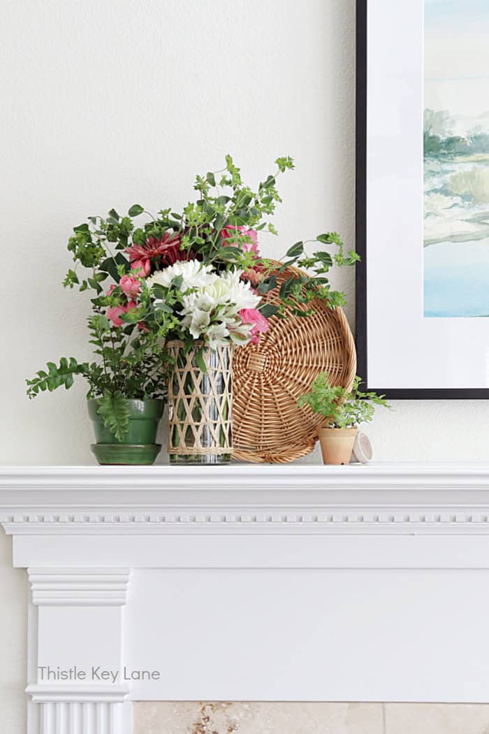 Fresh flowers, tray and ferns. Vintage Spring Mantel Decor Styling.