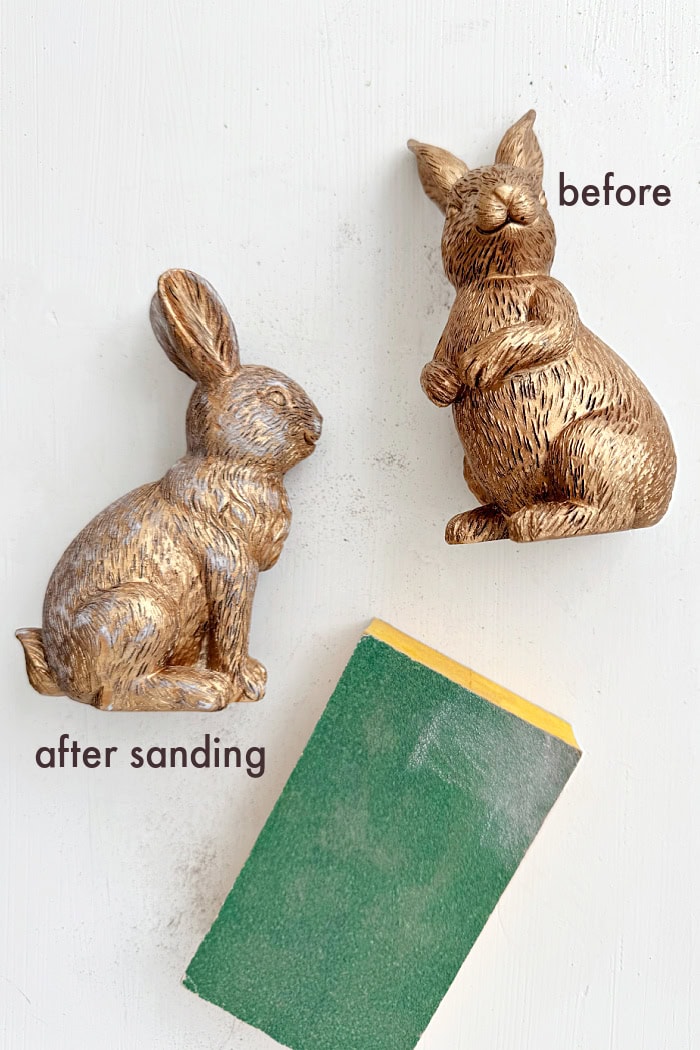 Sanding resin figurines.