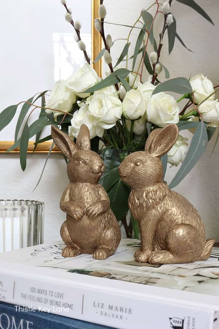 Figurines facing each other. DIY Antique Brass Resin Bunnies.
