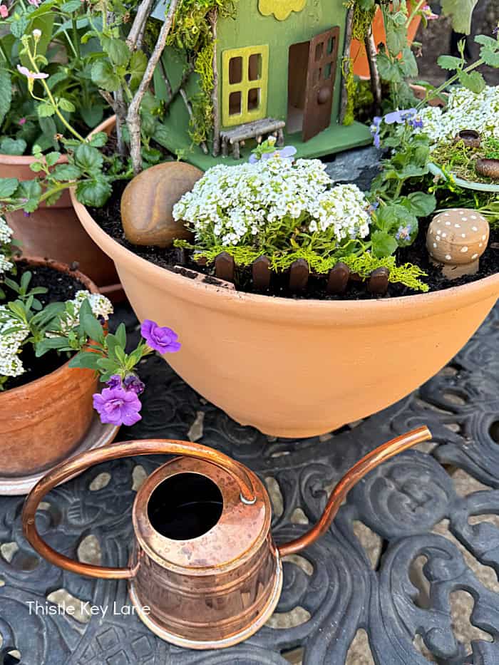 Flower pot after textured paint is applied. How To Make A Flower Pot Fairy Garden.