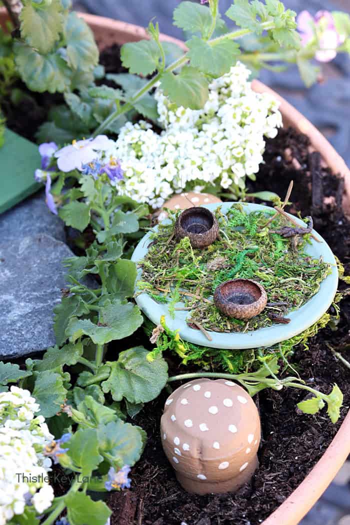 Fairy table with acorn cups. How To Make A Flower Pot Fairy Garden.