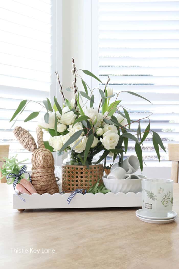 Spring vignette on a table. Spring Tray Flower Centerpiece