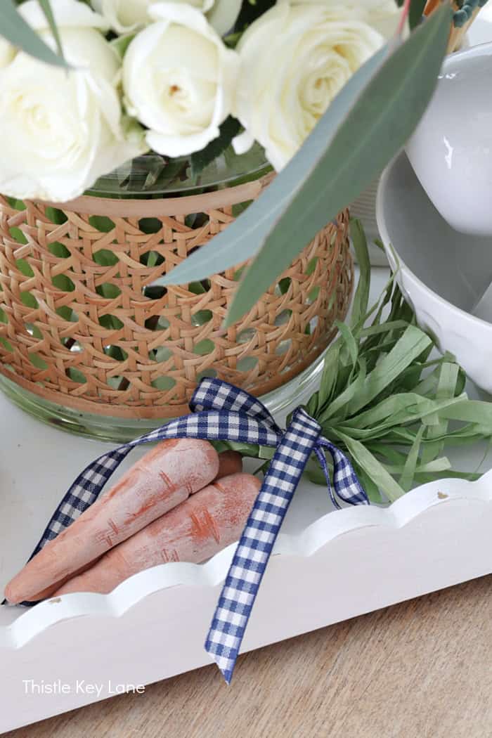 Clay carrots tied with gingham ribbon. Spring Tray Flower Centerpiece.