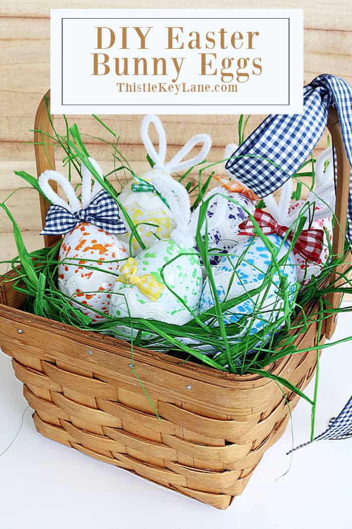 Eggs displayed in a basket with ribbon. DIY Easter Bunny Eggs. 