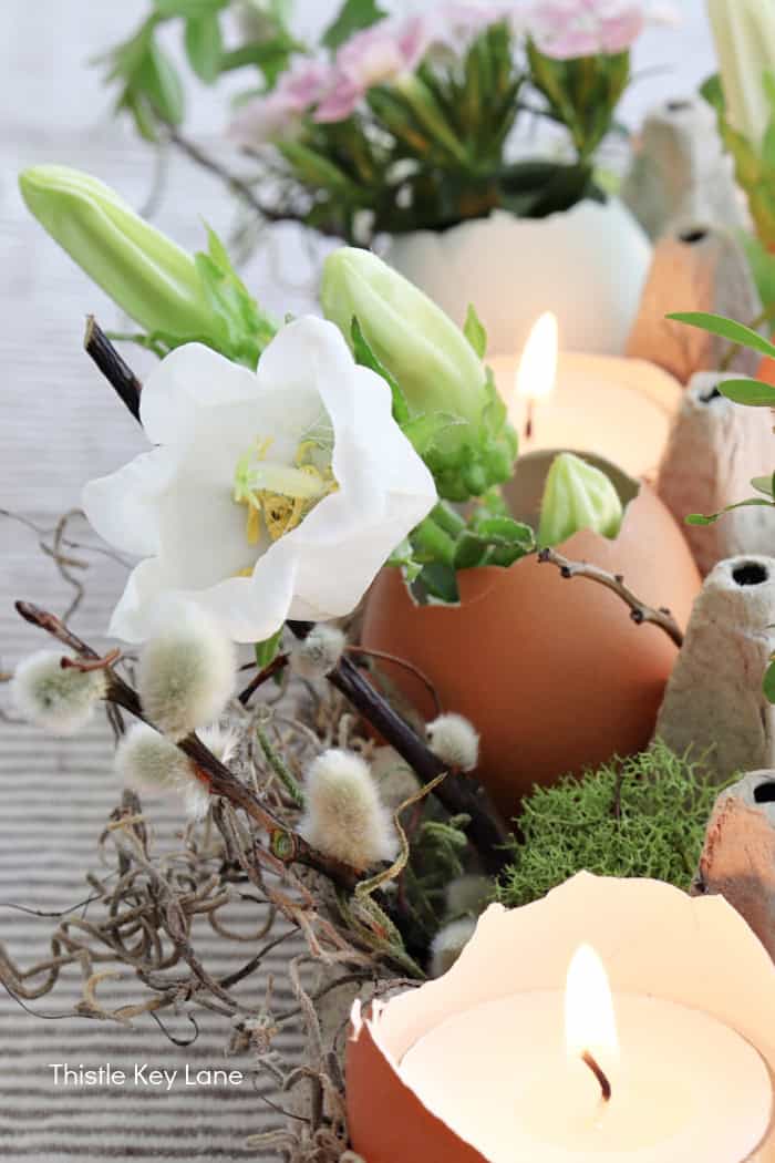 White box flower and puss willow. Rustic Easter Candle Arrangement.