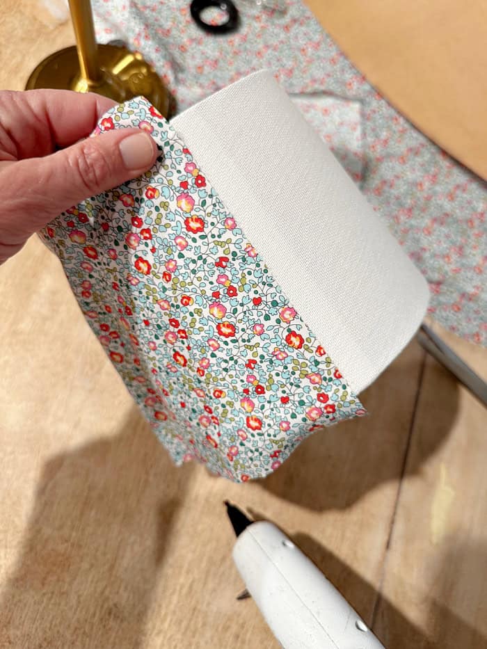 Hot glue fabric starting at the lampshade seam