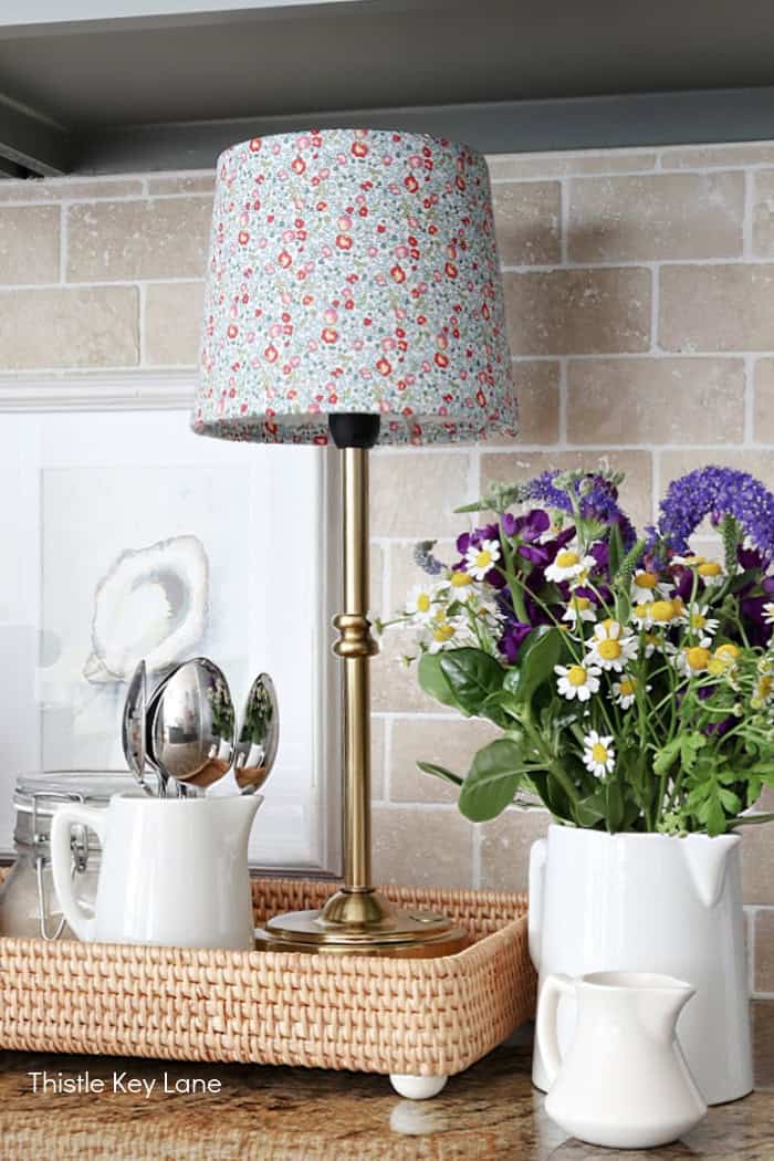 Finished lampshade with small print fabric. Lampshade Update With Fabric.