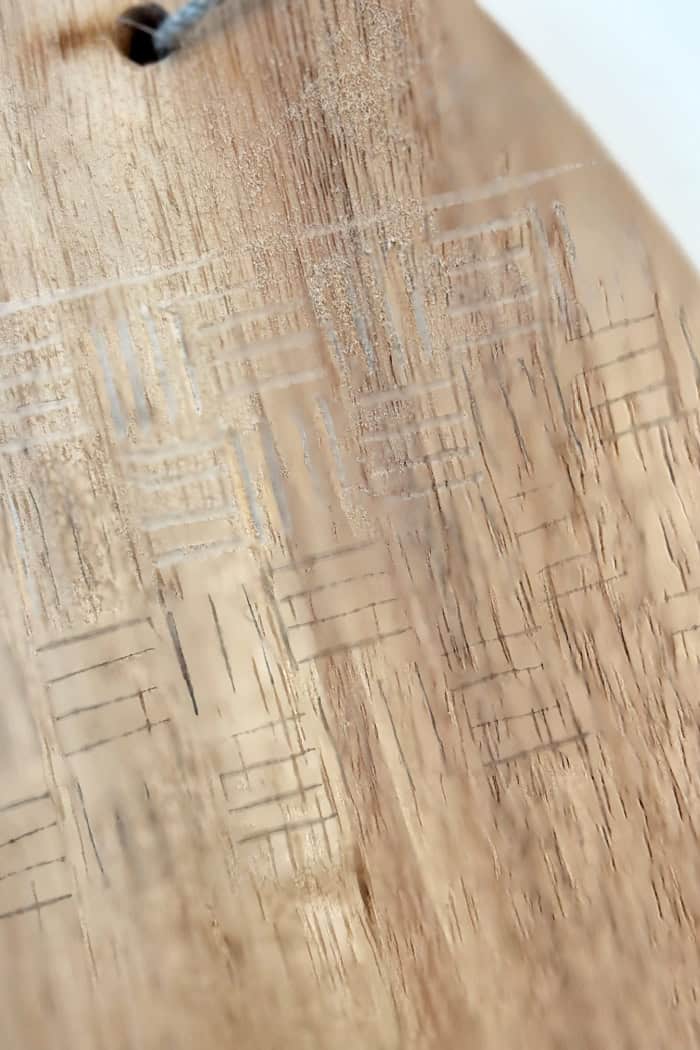 Pencil marks as guide lines for wood carving.