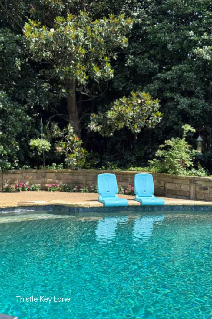 Chairs by the pool. Breezy Summer Patio Tour.