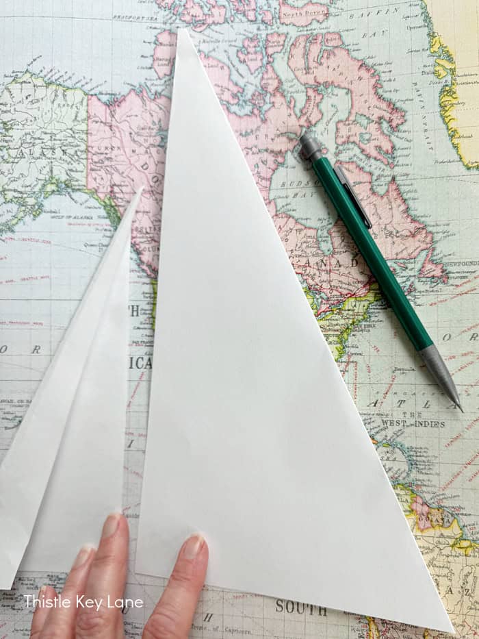 Pattern used to cut out triangles for sails. How To Make A Map Sailboat.