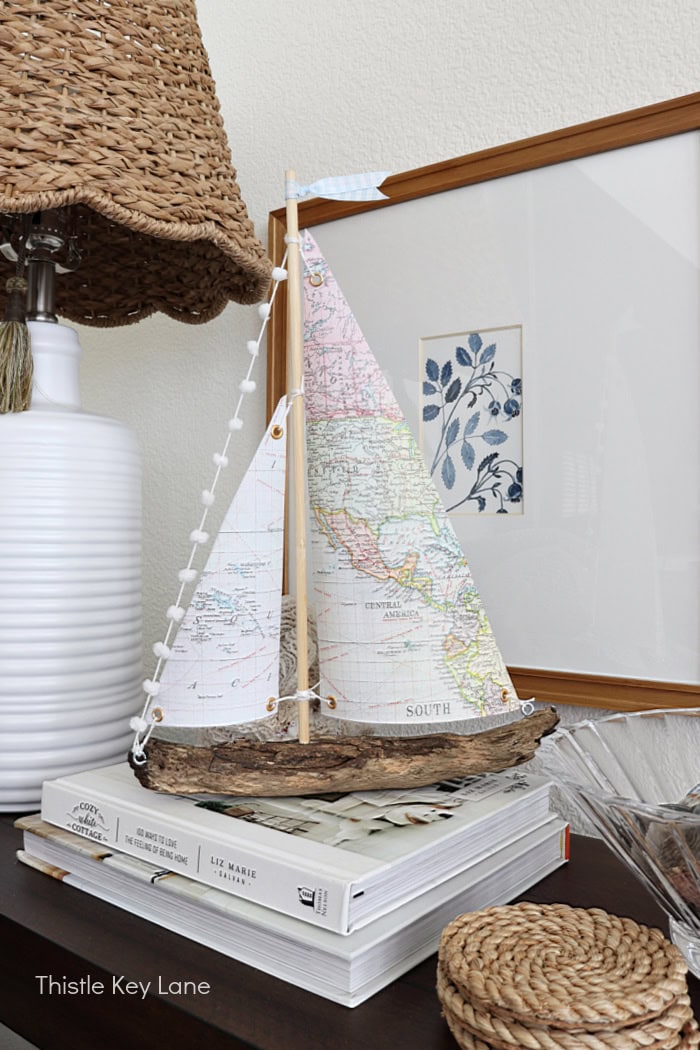 Cute DIY Sailboat for coastal decor. How To Make A Map Sailboat.