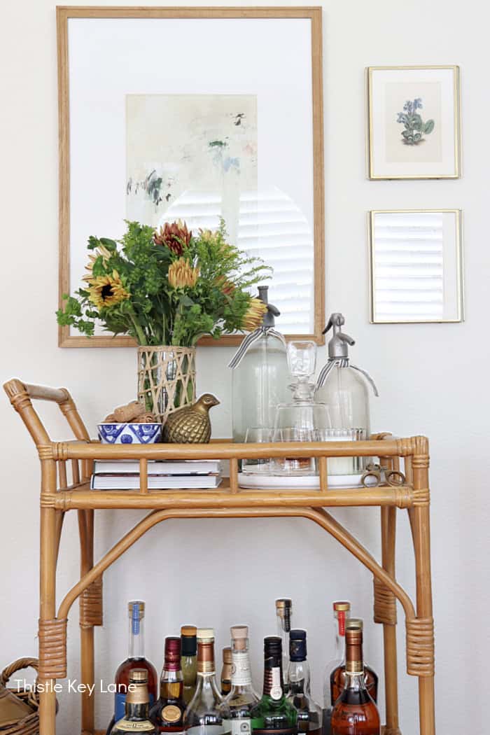 Gallery wall with bar cart. Summer To Fall Bar Cart With Sunflowers.