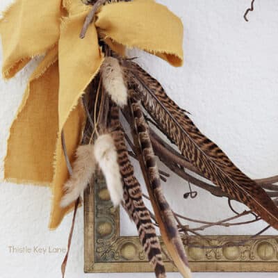 DIY Vintage Frame Wreath With Feathers