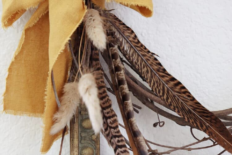 DIY Vintage Frame Wreath With Feathers