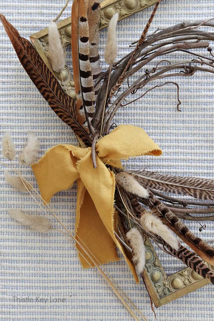 Dried bunny tail stems to wreath.