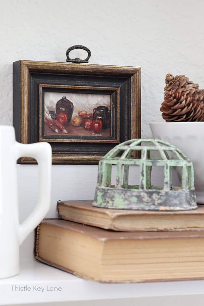 Fall oil painting in frame. Early Fall Plate Rack Styling.