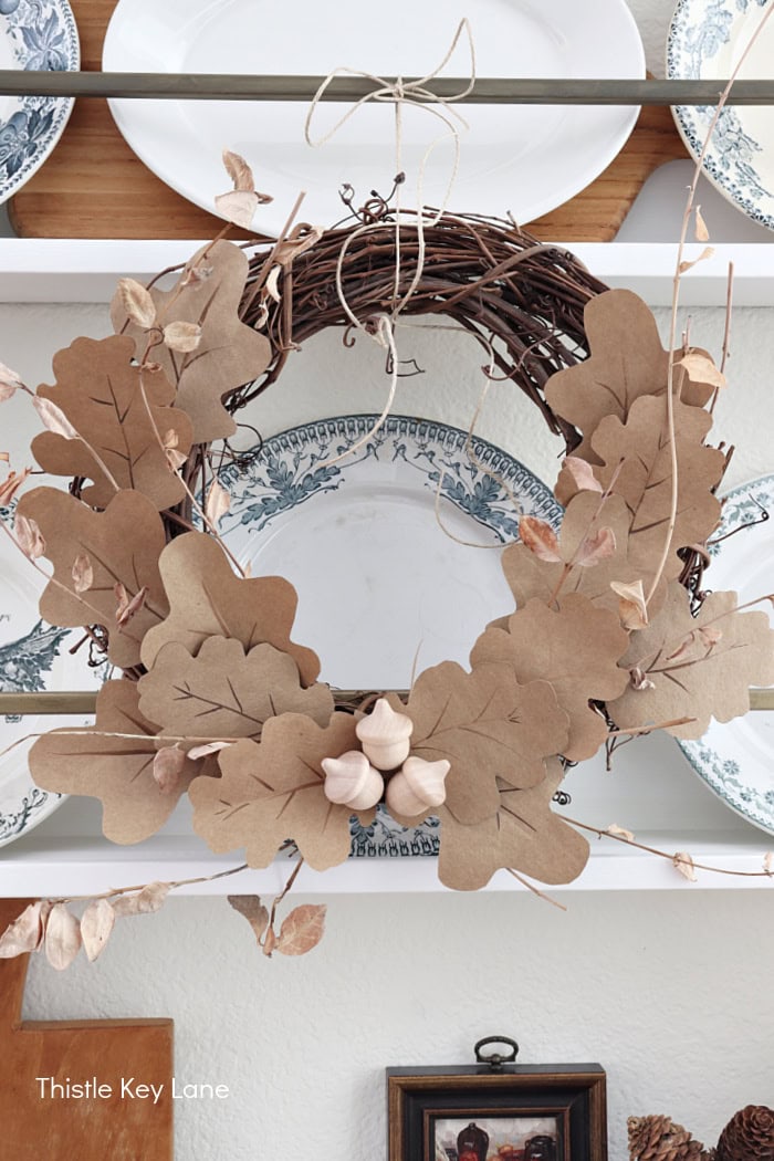 Paper bag wreath on plate rack. Early Fall Plate Rack Styling.