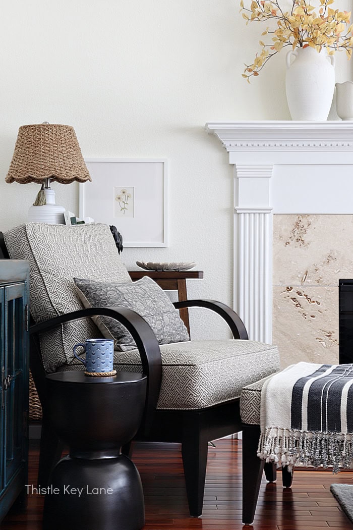 Cozy living room with beige and gray accents, fireplace. Cozy Autumn Family Room Decor.