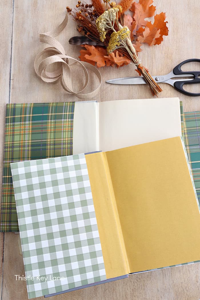 Book jackets in plaid and gingham. Fall Dried Florals Book Vignette.