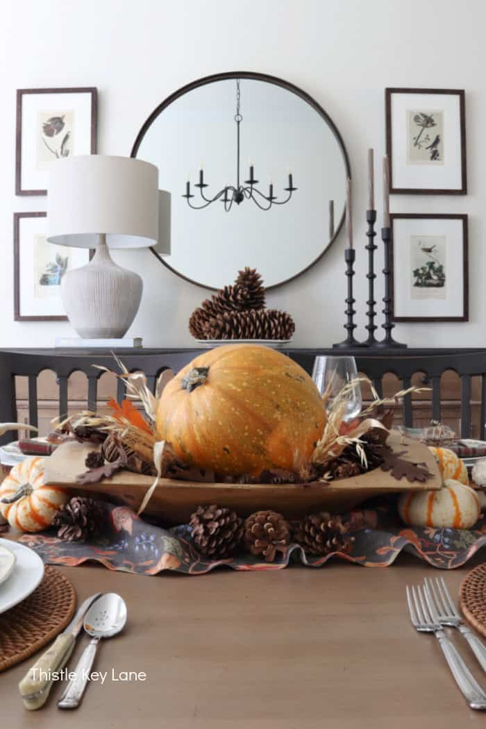 Autumn centerpiece, wall mirror, artwork, lamp. Rustic Thanksgiving Pumpkin Centerpiece And Tablescape.