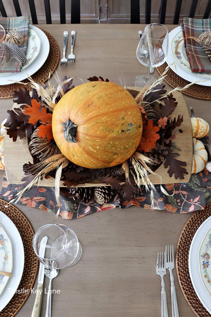 Top view of centerpiece. Rustic Thanksgiving Pumpkin Centerpiece And Tablescape.