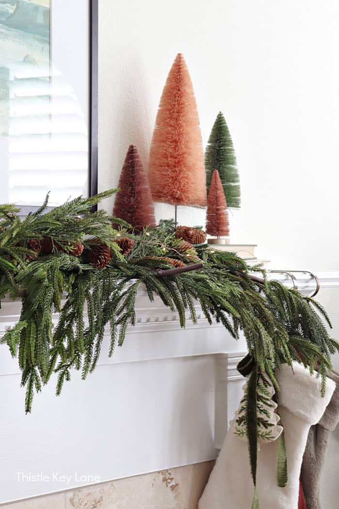 Bottle brush trees in rust, brown and green.