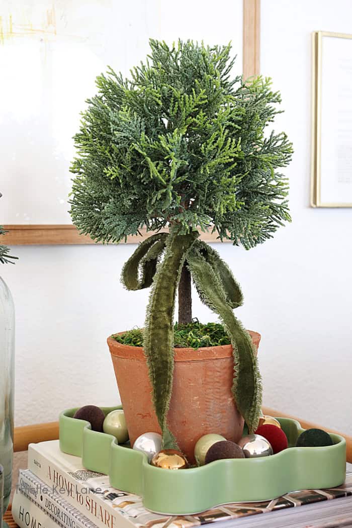 Topiary with ornaments on a tray. Country Cottage Christmas Home Tour.