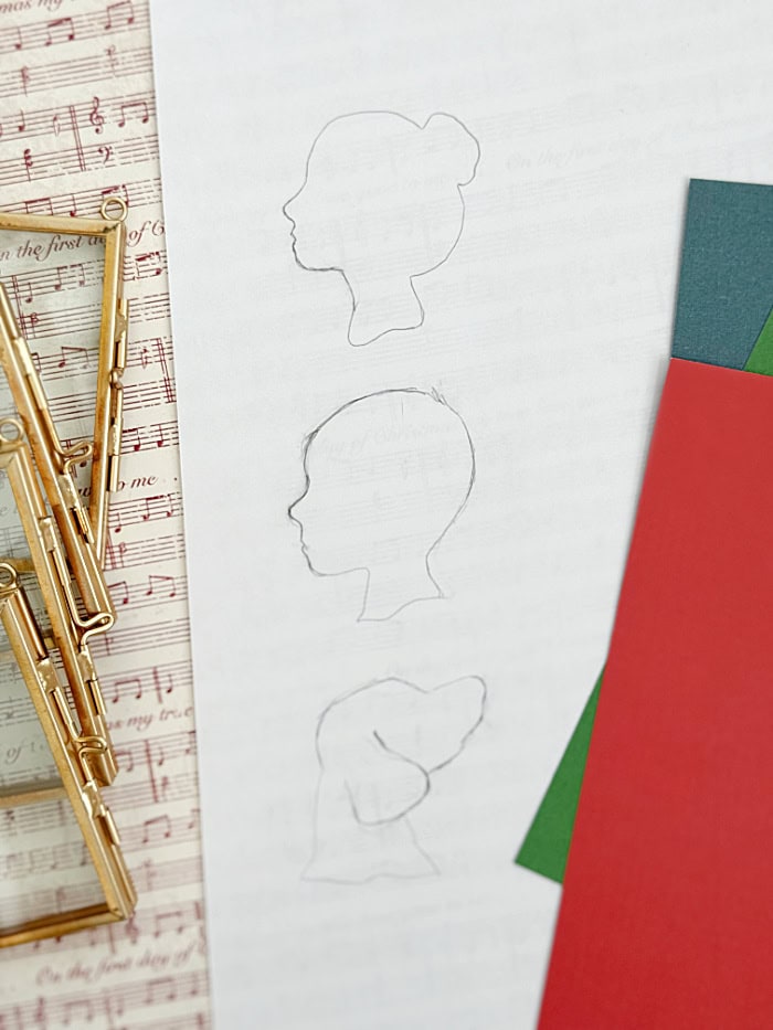 Trace silhouettes on white paper.