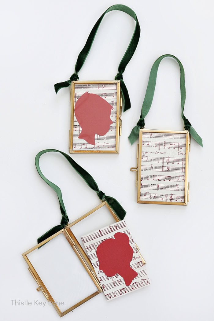Use ribbon to hang ornaments. DIY Silhouette Keepsake Ornaments.