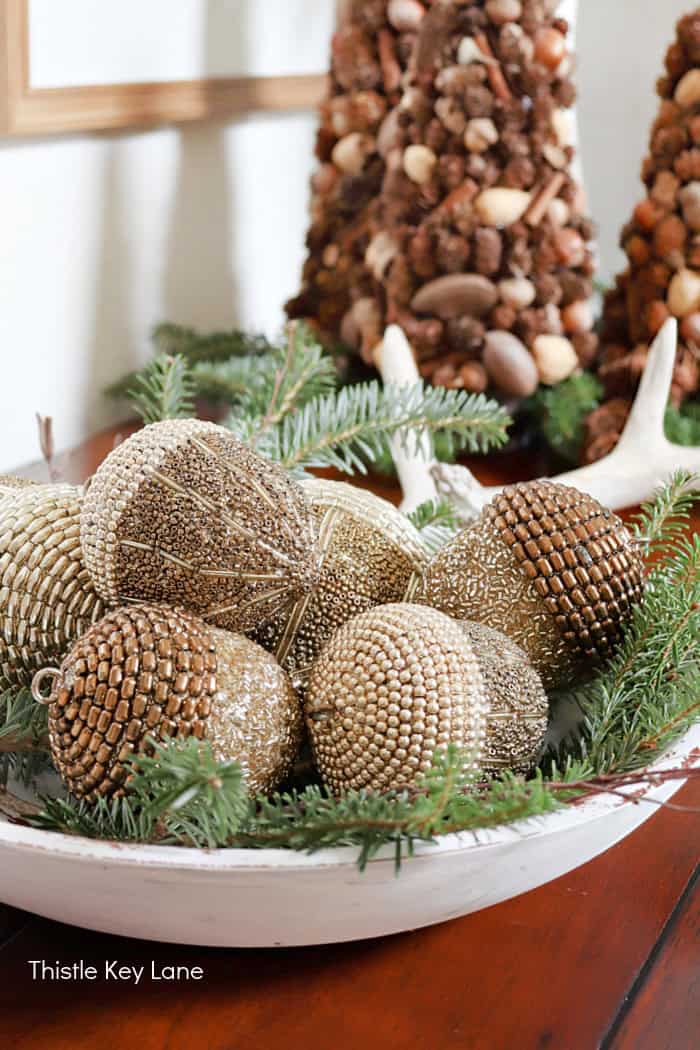 Beaded acorn ornaments in a bowl.