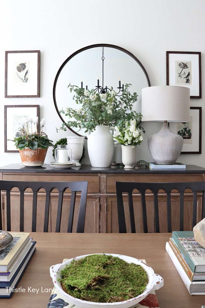 Dining room with spring decor. Floral Spring Vignette For Buffet Or Sideboard.