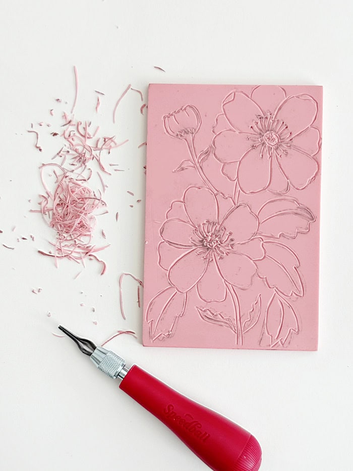 Carving into the lino rubber block. How To Make Block Print Art.