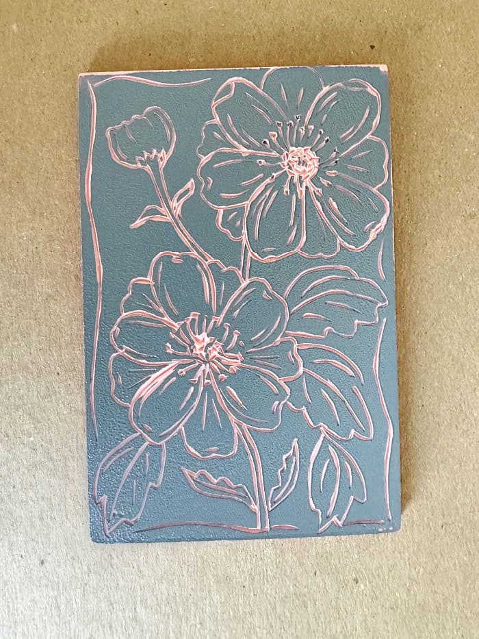 Ink covering a lino block.
