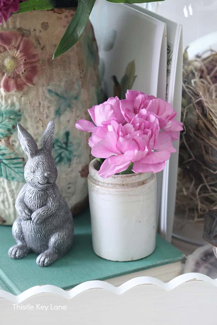 Bunny and mini ironstone jar with pink flowers.