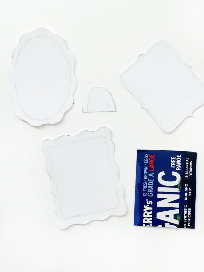 Patterns for cutting out frames and clothes for portraits.