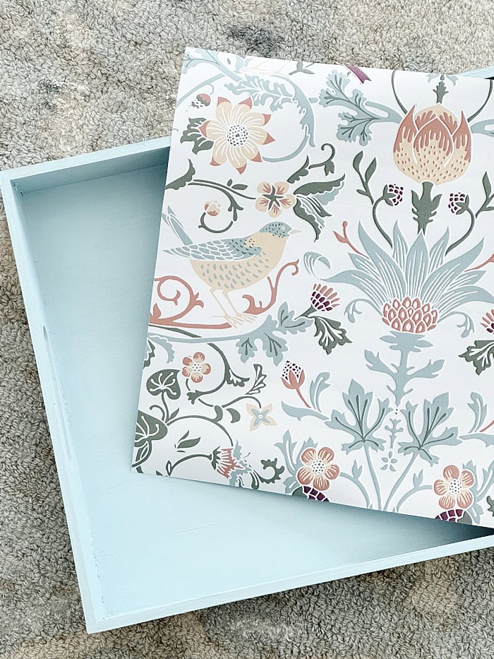 Small square of botanical wallpaper.