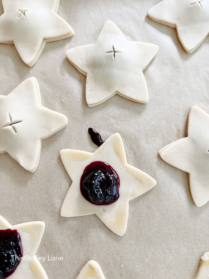 Adding blueberry sauce to star.