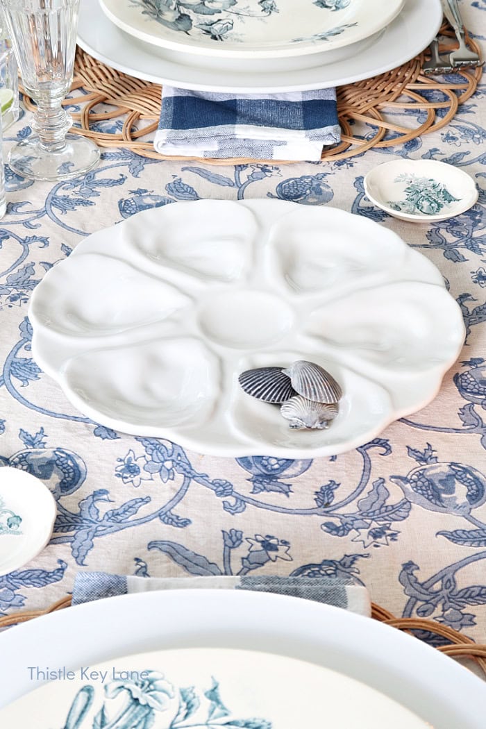 White oyster plate. French Country Style Table Setting.