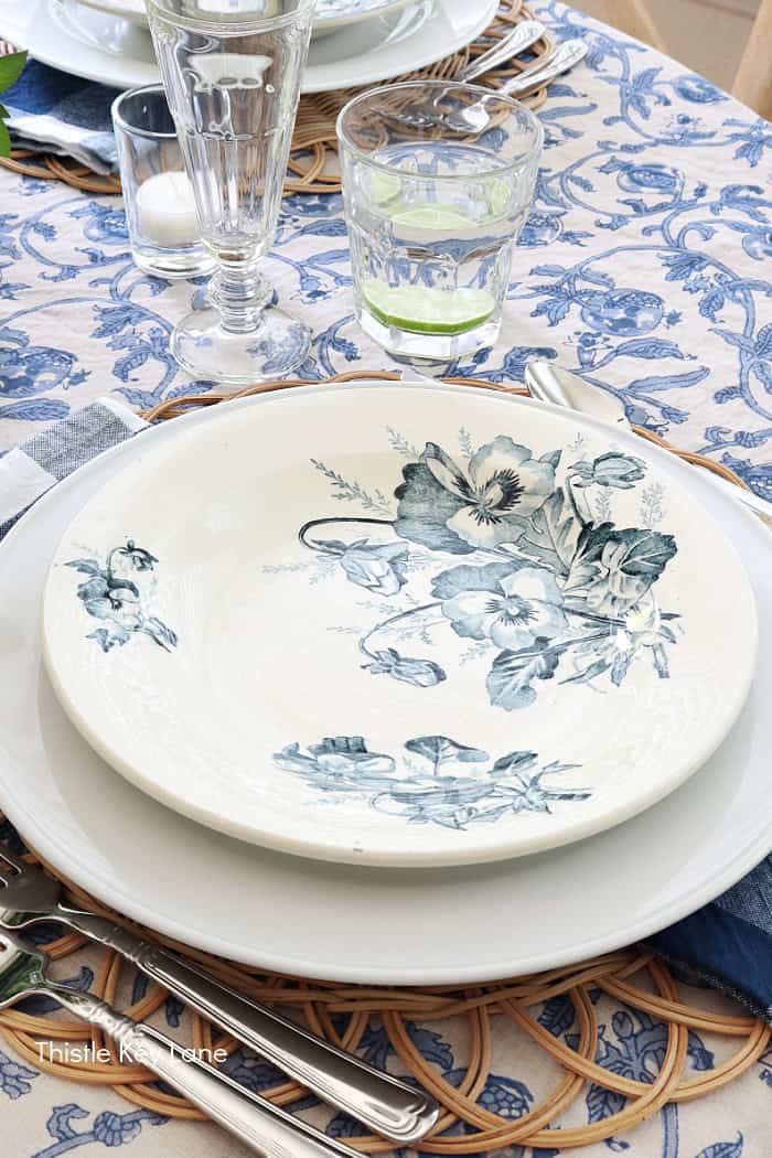 French transferware plate in blue and white. French Country Style Table Setting.