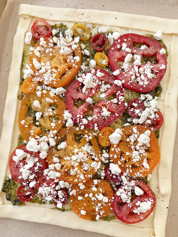Ingredients layered on a puff pastry.