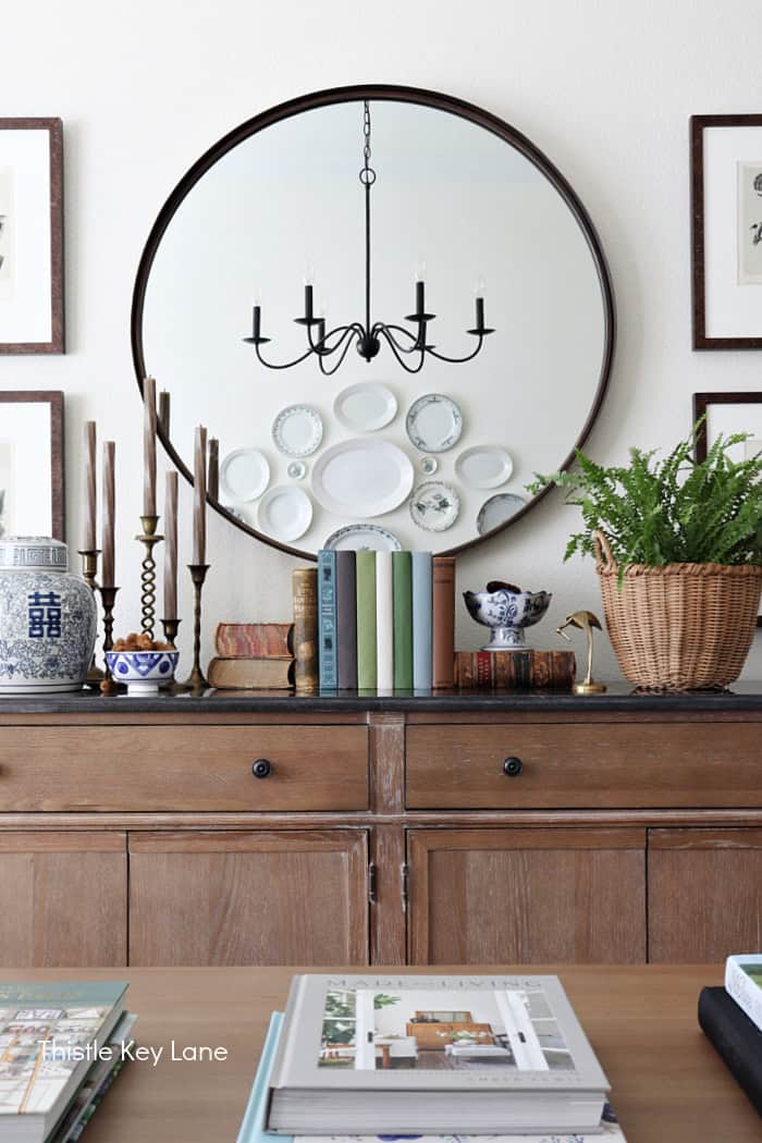Large mirror over a buffet table. Summer To Fall Sideboard Styling.