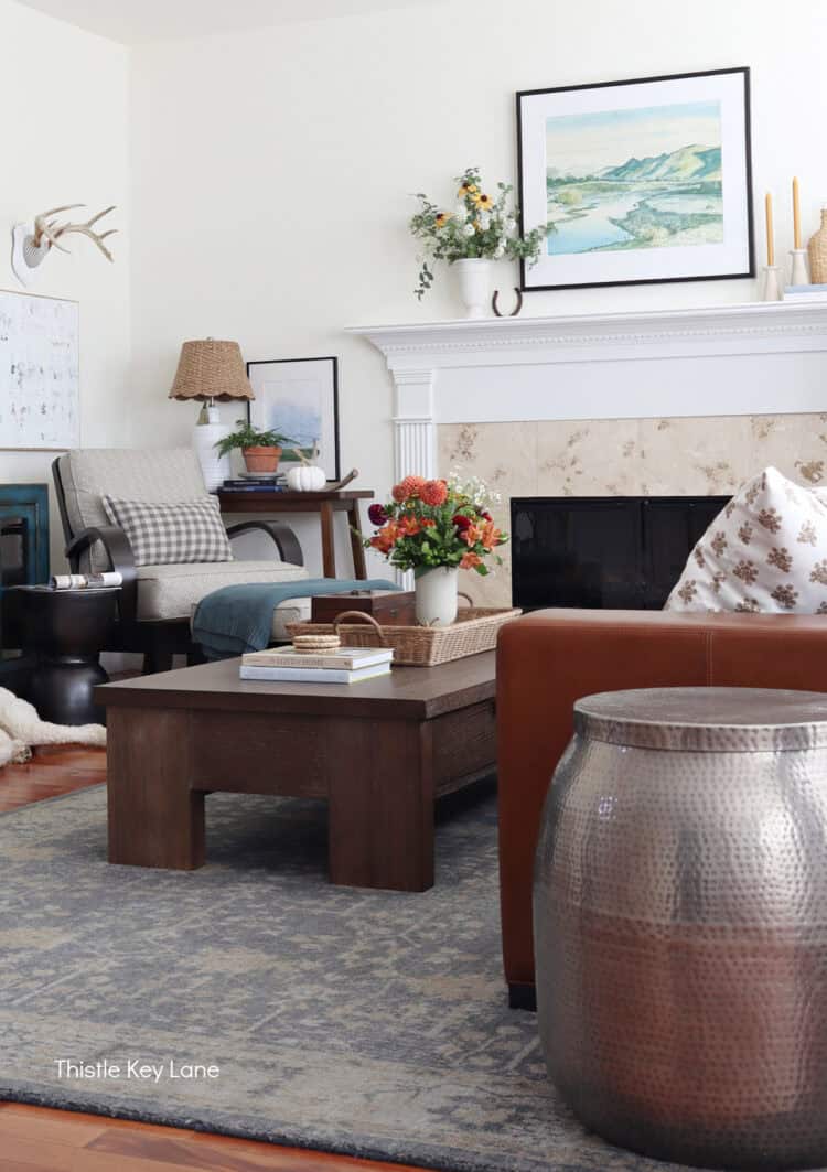 Family room with browns and blues. Mixing In Cozy Fall Decor.