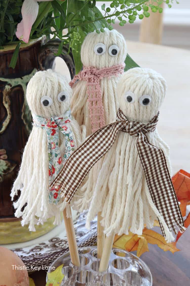 Yarn ghosts with scarves.