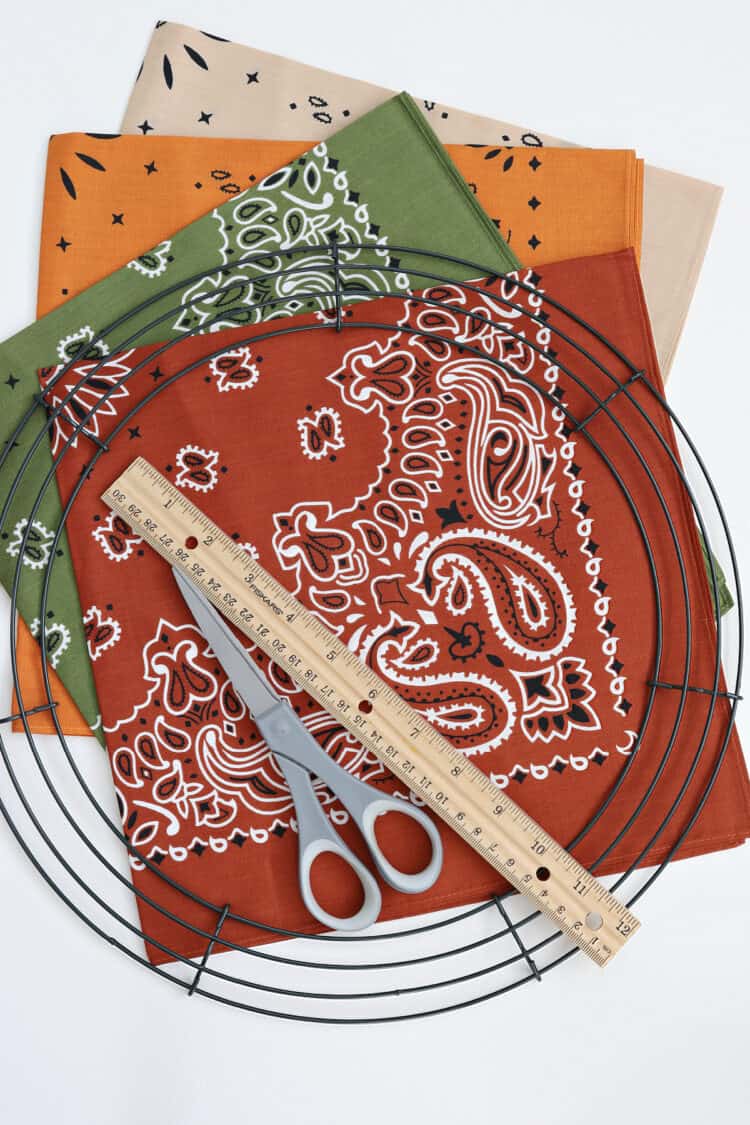 Supplies, bandanas, scissors, wire wreath form, ruller. Create A Fall Rope And Bandana Wreath.