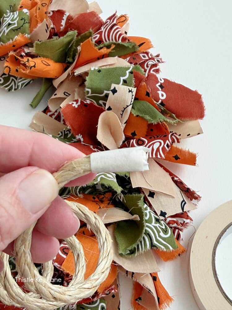 Add tape to end of rope.
